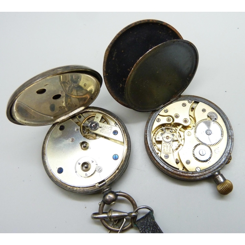 7254 - A .935 silver pocket watch, and a gun metal cased pocket watch (lacking glass)