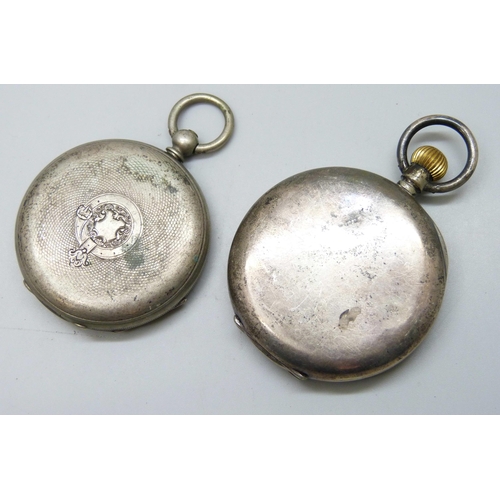 7255 - Two silver pocket watches and a silver cased wristwatch