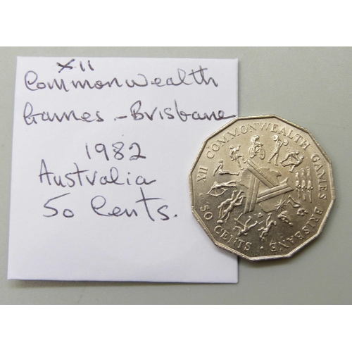 7267 - A collection of coins including Commonwealth Games Brisbane 1982 Australia 50 cents, Australia 1977 ... 