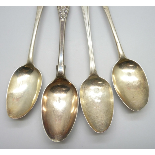 7292 - Three Georgian silver serving spoons, 170g, and a plated example