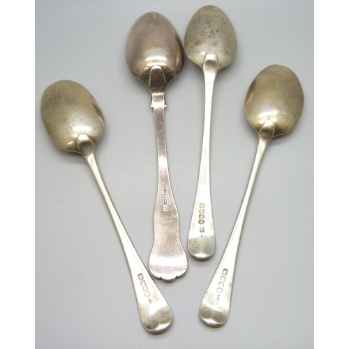 7292 - Three Georgian silver serving spoons, 170g, and a plated example