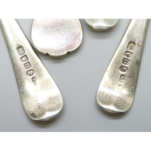 7292 - Three Georgian silver serving spoons, 170g, and a plated example