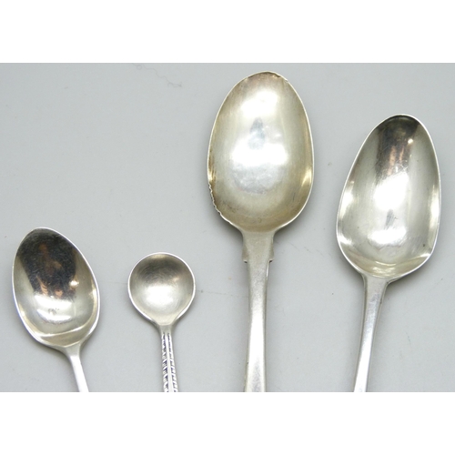 7295 - A collection of four silver spoons including Edward Sawyer, 1775, Birmingham, James Brady, 1825-1837... 