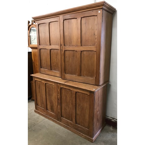 192 - A Victorian pine four door housekeepers cupboard