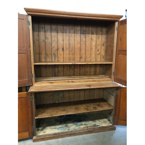 192 - A Victorian pine four door housekeepers cupboard