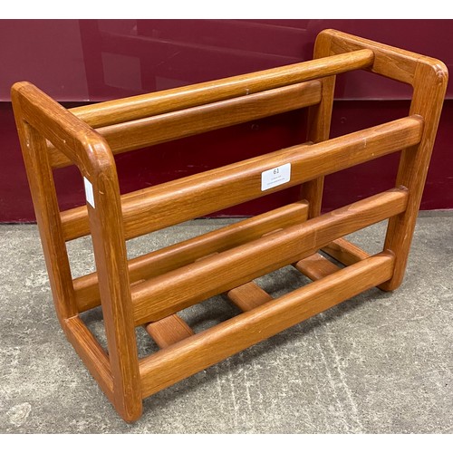 61 - A teak magazine rack