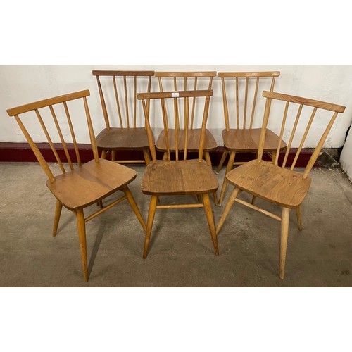 64 - A set of six Ercol Blonde elm and beech 391 model chairs