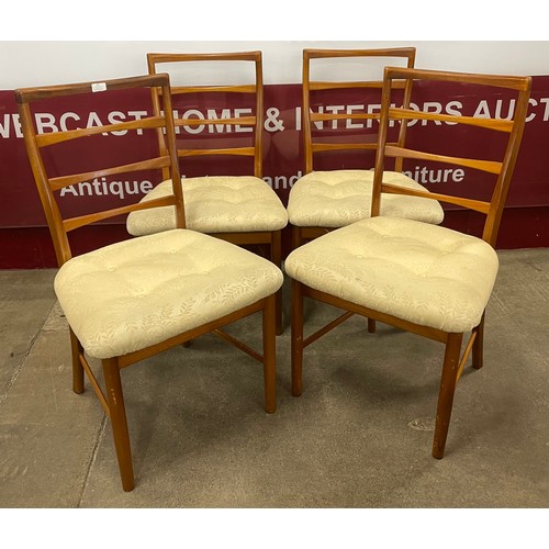 65 - A set of four McIntosh teak dining chairs