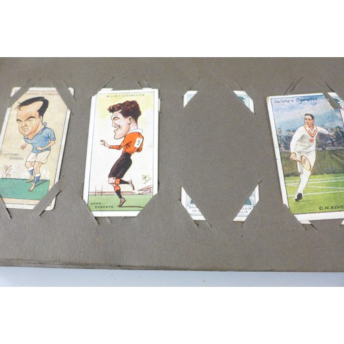 2306 - A large collection of cigarette and tea cards, loose and in albums, including Will's cricketers 1928... 