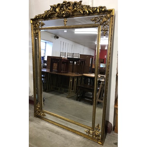198 - A large French style gilt framed mirror