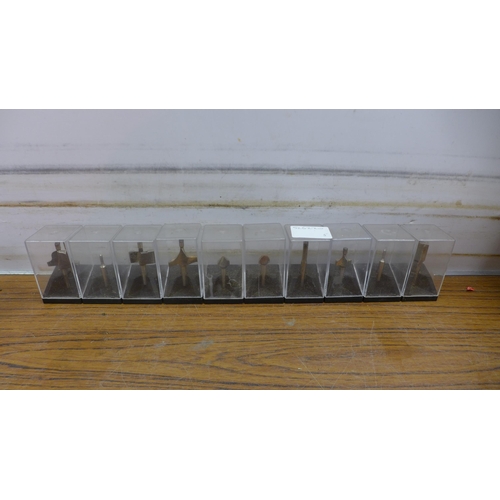 5054 - 11 assorted router bits, a 3