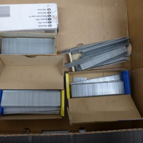 5062 - A quantity of assorted Brad nails, sanding belts, circular saw blades and band saw blades