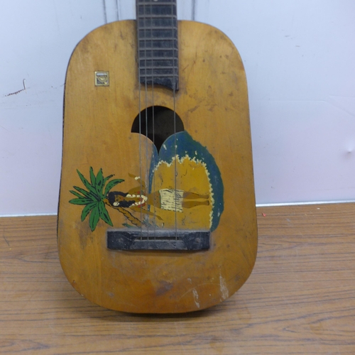 5064 - A vintage Hawaiian style acoustic guitar, an Encore electro acoustic guitar and an Aria Pro II elect... 