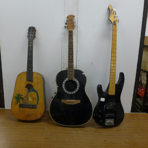 5064 - A vintage Hawaiian style acoustic guitar, an Encore electro acoustic guitar and an Aria Pro II elect... 