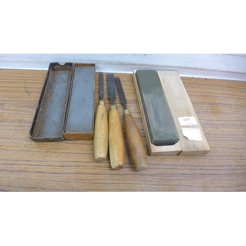 5079 - Three I. Sorby chisels and 2 oil stones