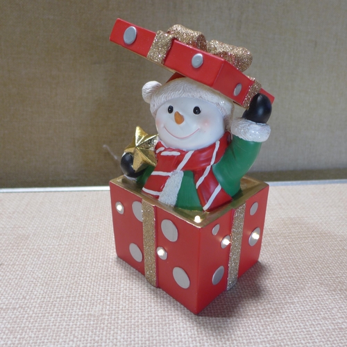 6030 - Snowman spinning lantern and an LED present figurine (damaged)  (353-285) *This lot is subject to VA... 