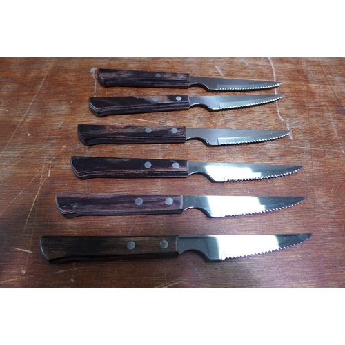 6053 - Quantity of X-Lite lighters and Tramontina steak knives (353-682) *This lot is subject to VAT