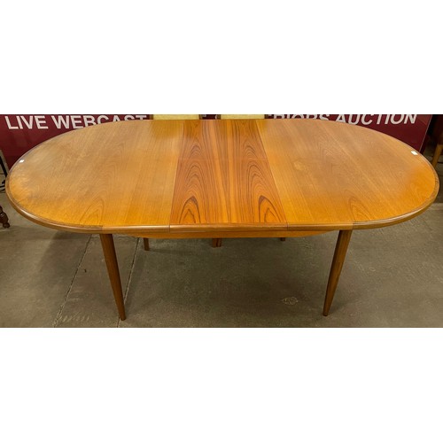 4 - A G-Plan Fresco teak oval extending dining table and six chairs