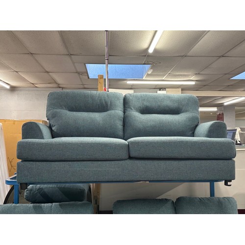 3180 - A dark cyan upholstered three seater sofa, two seater sofa, armchair and footstool