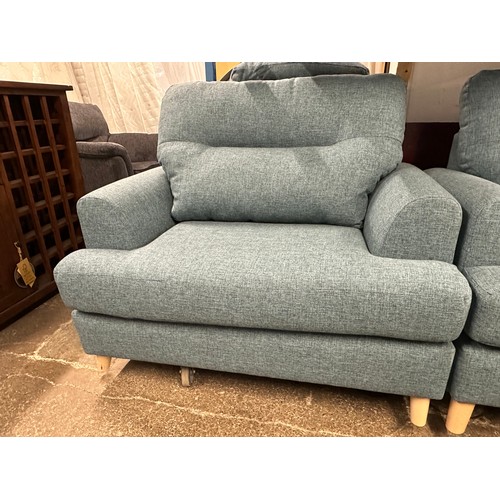 3180 - A dark cyan upholstered three seater sofa, two seater sofa, armchair and footstool