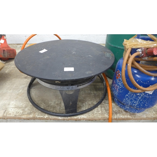 5138 - An Outland Firebowl gas fire pit with full patio gas bottle and one other gas bottle