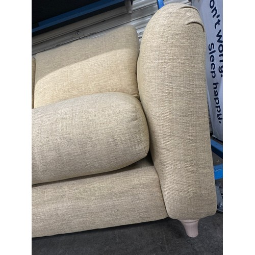 3205 - A turmeric upholstered deep seating three seater sofa