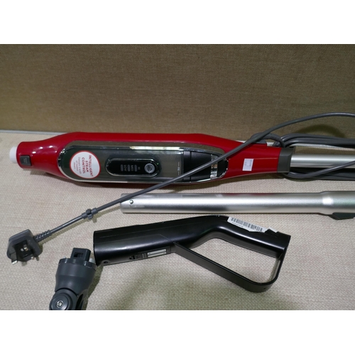 6238 - Powerglide floor cleaner and a shark steam mop (missing battery) (353-661) *This lot is subject to V... 