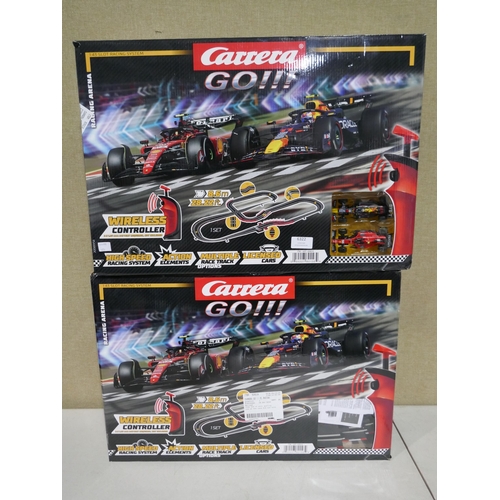 6322 - Two Carrera Go!!! F1 racing arenas and Marvel Spidey play set (353-424,460) *This lot is subject to ... 