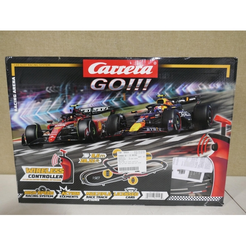 6322 - Two Carrera Go!!! F1 racing arenas and Marvel Spidey play set (353-424,460) *This lot is subject to ... 