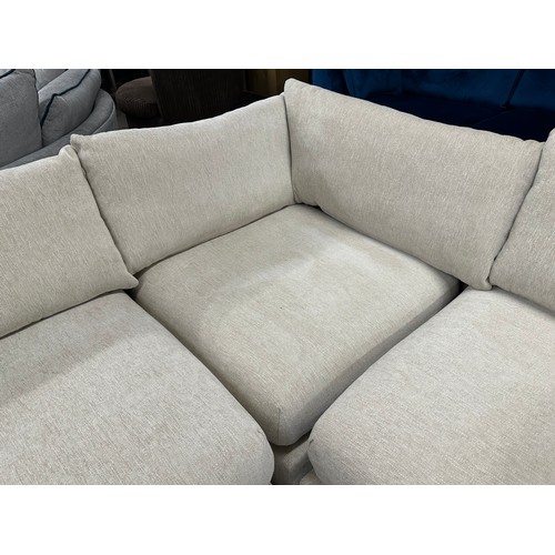 3208 - A sand upholstered six piece sectional corner sofa