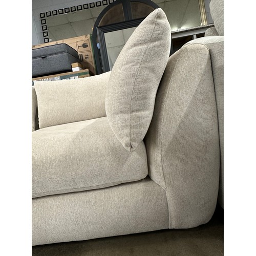 3208 - A sand upholstered six piece sectional corner sofa