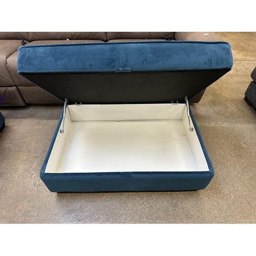 3219 - A large dark blue velvet storage footstool (damaged)