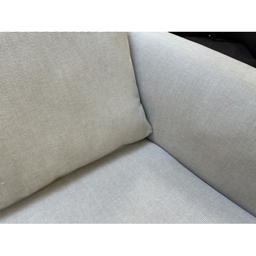 3264 - An ivory upholstered deep seating love seat