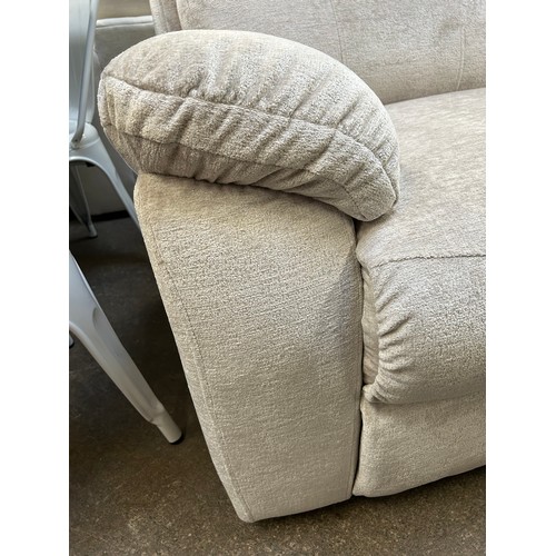 3227 - A cream pile velvet upholstered two seater sofa