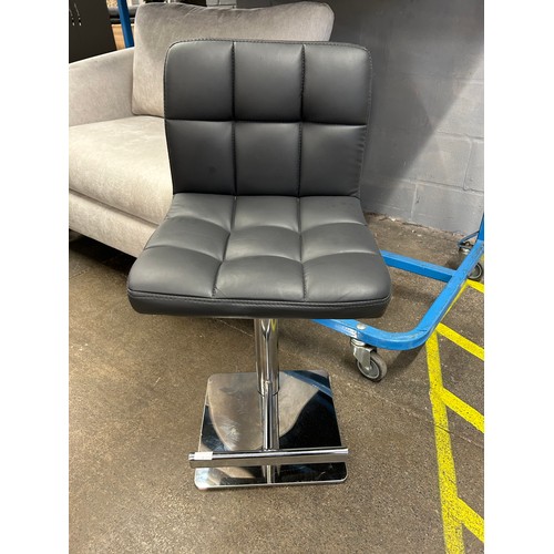 3255A - A grey leather gas lift bar stool