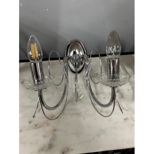 3075 - A pair of chrome wall lights