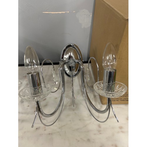 3075 - A pair of chrome wall lights