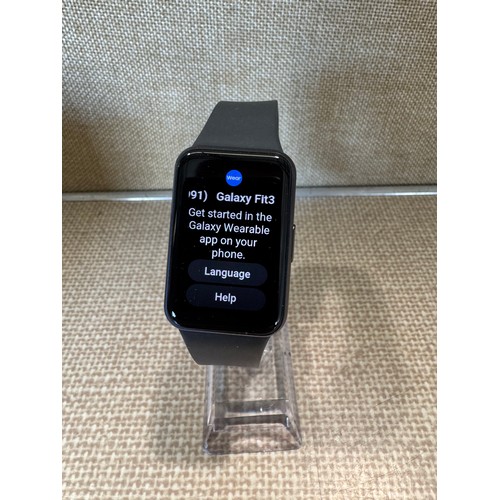 6001 - Samsung Galaxy Fit3 smart watch with grey activity band, RRP £59.99 *This lot is subject to VAT