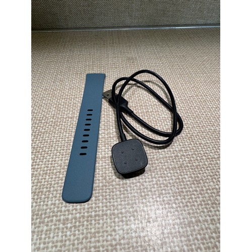 6009 - Fitbit Versa 4 fitness smartwatch with blue infinity band, model no: FB523 *This lot is subject to V... 