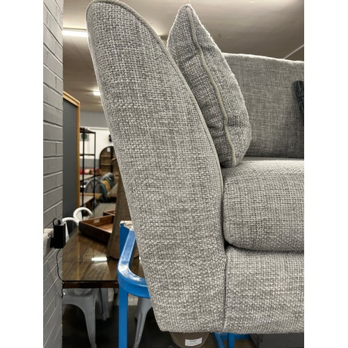 3208 - A grey woven three seater sofa and storage footstool