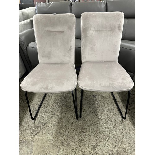 3279 - A pair of taupe velvet dining chairs *This lot is subject to VAT