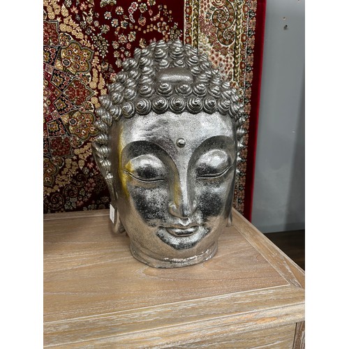 3064A - A large Buddha head