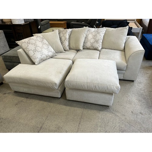 3295 - An ivory upholstered compact corner sofa with footstool