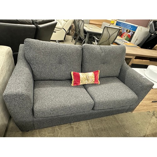 3298 - A dark static grey upholstered two seater sofa bed - (no mattress)