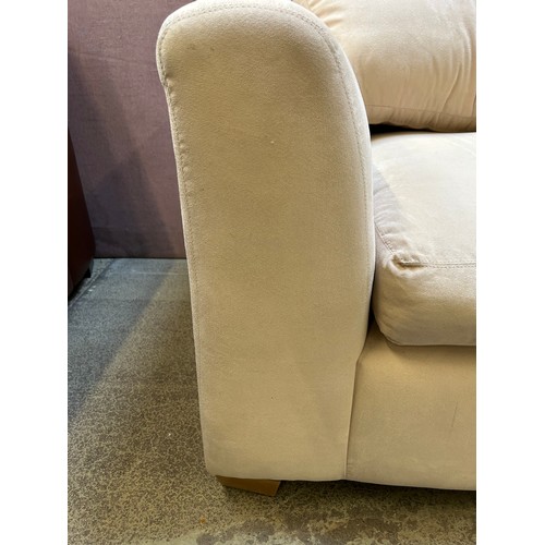 3304 - A beige velvet corner sofa