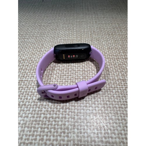 6030 - Fitbit Inspire 3 fitness tracker with lilac activity band, RRP £84.99 *This lot is subject VAT