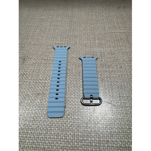 6034 - Apple Watch 49mm ice blue ocean band with natural titanium finish, model no: mxtf3zm/a and one other... 