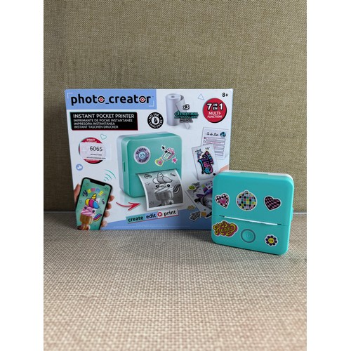 6065 - Photo Creator instant pocket printer *This lot is subject to VAT