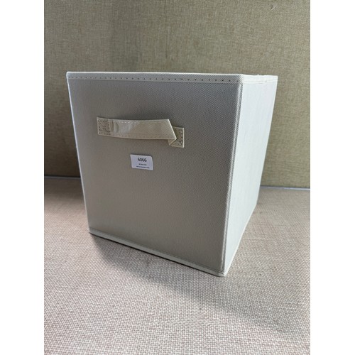 6066 - Six cream fabric collapsible storage cubes *This lot is subject to VAT