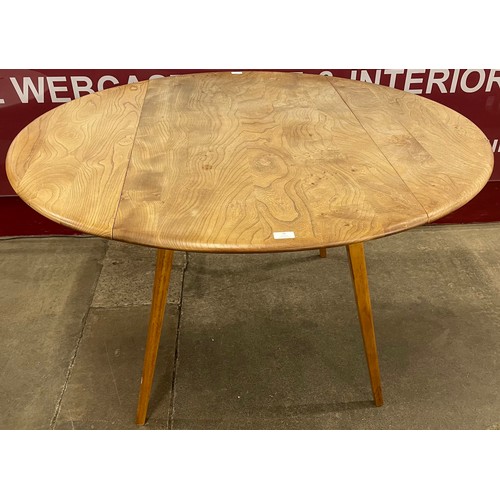 36 - An Ercol Blonde elm and beech Windsor drop leaf table